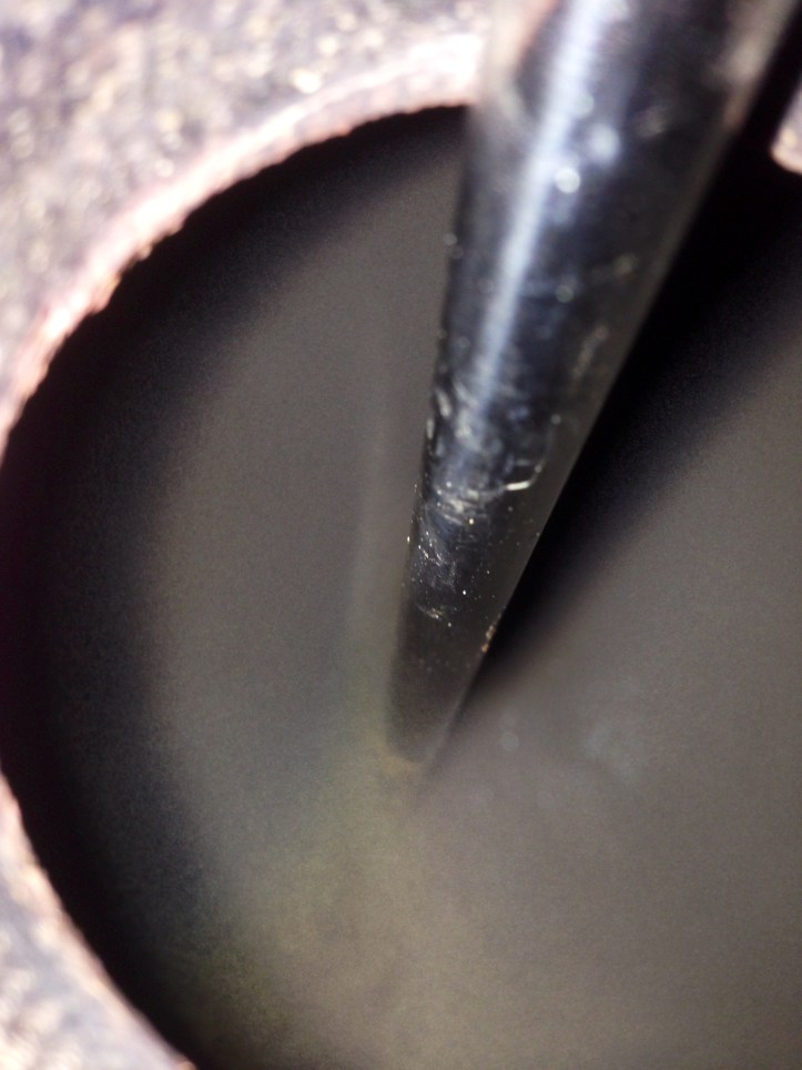 It's hard to see, but we left behind less than a cup of beer in the barrel.